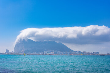 The rock of Gibraltar under clouds.
