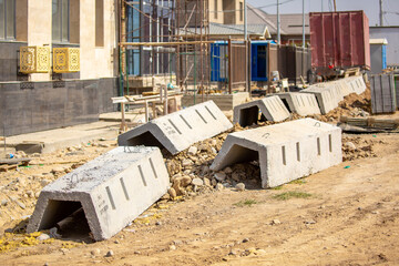 Construction and installation of ditches for drainage in the city. Rain ditches are being repaired...