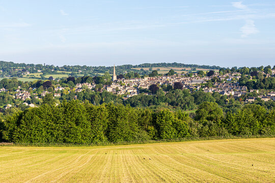 Early morning light on Midsummers Day (June 21st) on the Cotswold town of Painswick, Gloucestershire , England UK