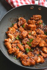 frying pan with chicken