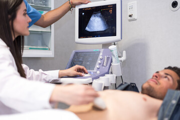 Man under ultrasound scan investigation