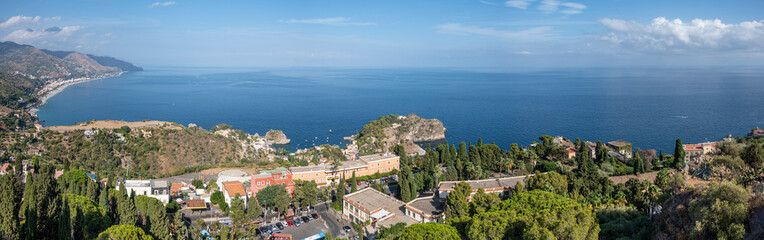 Naklejka na ściany i meble Aerial wide angle view of Taormina and its beautiful coastline