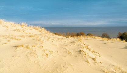 large sand dune by the sea