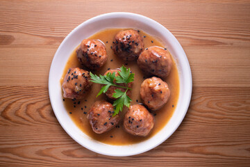 Tapa of beef meatballs with red wine sauce. Traditional Spanish recipe.