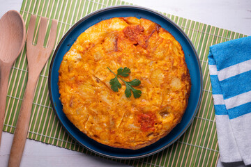 Spanish potato and chorizo ​​omelette. Traditional recipe of the tapa queen in Spain.