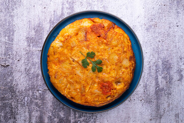 Spanish potato and chorizo ​​omelette. Traditional recipe of the tapa queen in Spain.