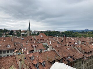 Old buildings in Switzerland. Switzerland city center Bern old building made of red bricks. Building rooftop from brick. City landscape in the summer day. Europe Swiss city center. Architecture house.