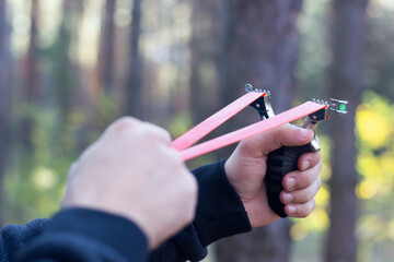 sports slingshot in hand close up