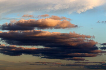 Large rain clouds in the sky over the sea.