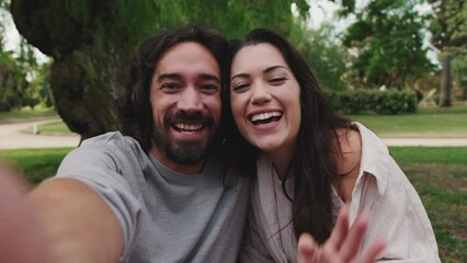Couple in love making video call with mobile phone