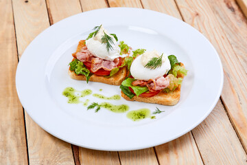 poached egg with bacon and herbs