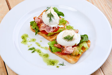 poached egg with bacon and herbs