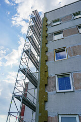 Multistorey apartment house facade cladding with thick mineral rockwool slabs