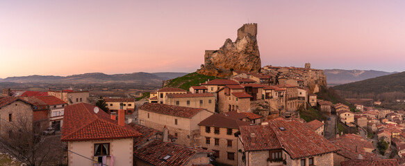 Panoramic landscape of the medieval village of Frías with old stone buildings and castle in the...