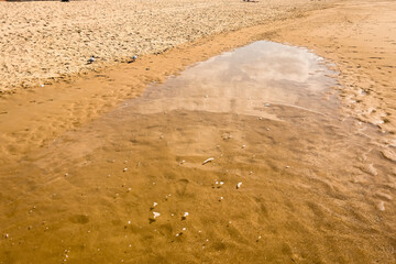 Small puddle on the coast