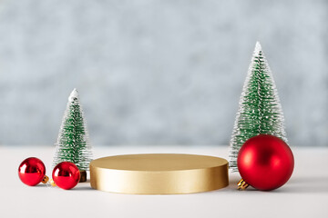 Christmas mock up with Christmas ornaments and trees for design. Christmas template with podium for...