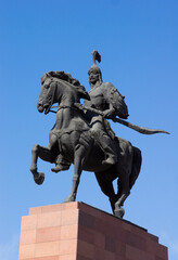 Fototapeta na wymiar Bishkek, Kyrgyzstan - 10.10.2022: Monument for Manas Baatyr on Ala-Too square
