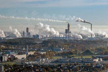 aerial panoramic view on smoke of pipes of chemical enterprise plant. Industrial landscape...
