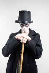 man with skull and skeleton in halloween costume