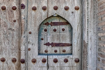 Small window in the old gate of the caravanserai