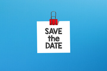 Save the date. Metal clip with note paper and save the date