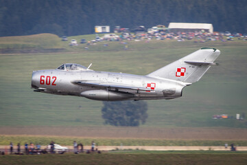 Historic sovjet fighter jet MIG 15 from Poland taking off at an airshow
