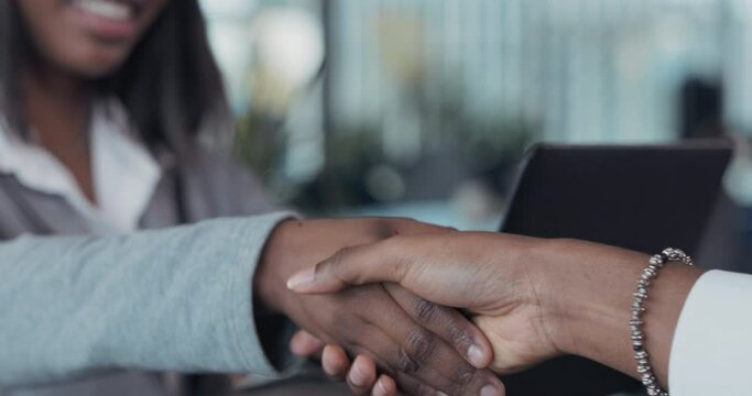 Close up view of business partnership handshake. Concept of business people handshake process.Successful deal after big meeting.