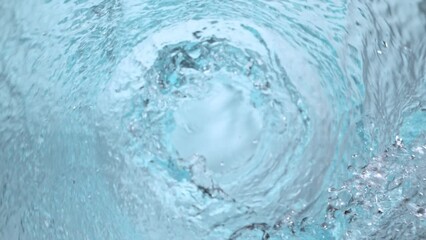 Super Slow Motion Shot of Water Vortex Splash on Black Background at 1000fps.