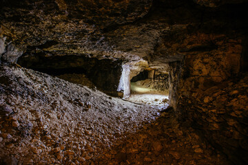 Obraz premium Old abandoned collapsed limestone mine