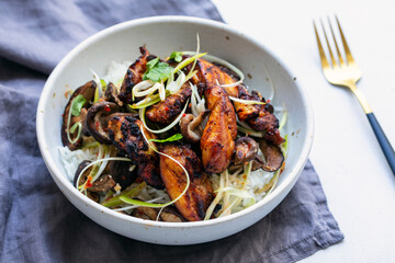 Rice with spicy chicken tighs, shiitake mushrooms and spring onions