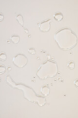 Coconut Oil drops on glass