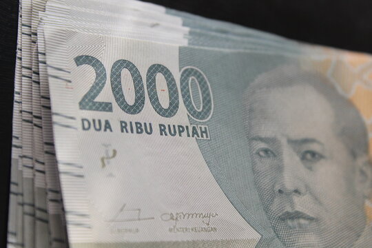 some two thousand rupiah bills