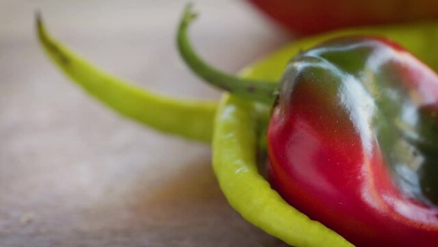Close up of deformed red and green hot chili pepper