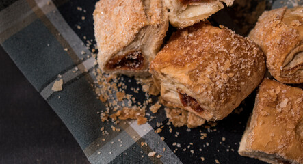 Sweet colombian traditional food with sugar on black wooden table