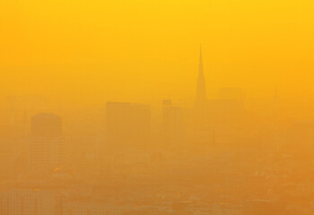Fototapeta na wymiar Yellow fog over the city