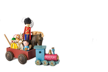 Fototapeta premium Wooden vintage Christmas toys and gifts on a white background.