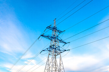 electricity pylons, high-voltage electricity pylon with blue sky.