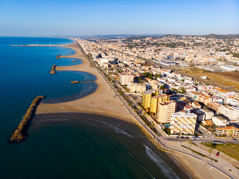 Aerial drone view of Playa de Cunit on sunny winter day, Tarragona, Spain