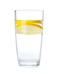 Glass with water and sliced lemon on white background