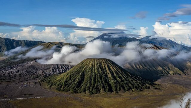 Java, Indonesia 06182022-Mount Bromo and Mount Semeru timelapse smoke on left.