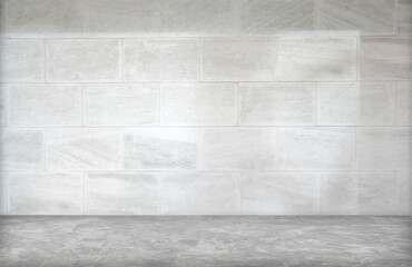 Gray cement wall texture background in empty room with light and shadow.