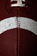 close up on leather of an American football 