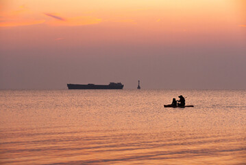 kayak and sunset in the lake