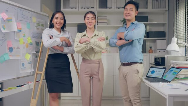 Portrait of Group of Asian young businessman and woman work in office. 