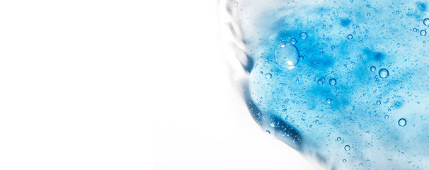 Gel texture of cosmetic serum. transparent cream for skin care on the background of bubbles. Transparent color cosmetic product close-up
