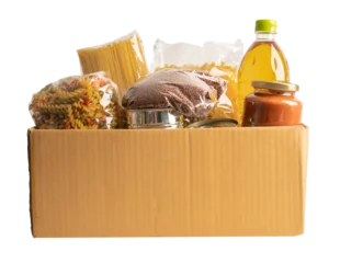 Photo sur Aluminium brossé Manger Foodstuff for donation, storage and delivery. Various food, pasta, cooking oil and canned food in cardboard box.