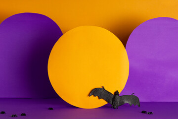 Halloween bat mockup on colorful purple and orange background.