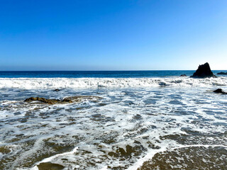 waves crashing on the beach