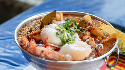 Tom Yum Kung Noodles in a hot pot ready to eat