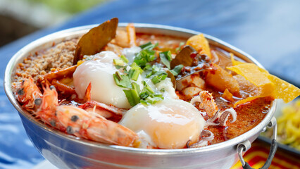 Tom Yum Kung Noodles in a hot pot ready to eat